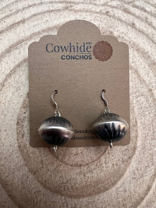 Handmade and stamped Navajo Pearl Earrings by Preston Haley